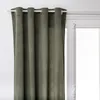 A close-up view of a green curtain hanging from a white curtain rod. Náhled obrázku produktu