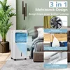 A bedroom setting with a portable air cooler and promotional graphics. Produktbild-Vorschau