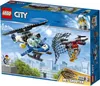 The image shows the packaging of a LEGO City police set, featuring a helicopter and a drone. Voir les images du produit