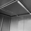 Interior view of a metal storage shed, focusing on the ceiling structure and upper part of the walls. Náhled obrázku produktu