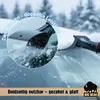 A close-up of an ice scraper clearing snow and ice from a car windshield on a snowy day. Produktbild-Vorschau