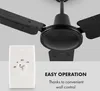 A close-up shot of a black ceiling fan with a white wall control panel in the foreground. Náhľad obrázku produktu