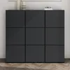 A modern, dark gray cabinet with nine square doors, set against a light gray wall and a wooden floor. Produktbild-Vorschau