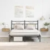 A bedroom scene featuring a metal bed frame with beige headboard panels, two pillows, and a white duvet. Two wooden floating nightstands are mounted on the wall, one on each side of the bed. Above the bed are two abstract art pieces depicting sandy beach l Náhled obrázku produktu