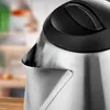 Close-up of the spout and lid of a stainless steel electric kettle. Anteprima dell’immagine prodotto