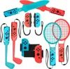 A collection of Nintendo Switch accessories for sports games, including tennis rackets, golf clubs, and sword-like attachments, all in red and blue colors. Produktbild-Vorschau
