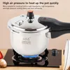 A pressure cooker is shown on a gas stove with a blue flame. Produktbild-Vorschau