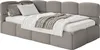 A corner daybed with pillows and a blanket. Produktbild-Vorschau