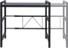 A black microwave stand with two shelves and a metal frame. Náhľad obrázku produktu