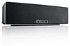 A black and silver portable Bluetooth speaker is shown from the front, resting on a reflective surface. Produktbild-Vorschau