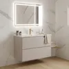 A modern bathroom vanity with a sink and mirror. Produktbild-Vorschau