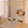 A cat scratching post with balls inside, shown in a home environment. Produktbild-Vorschau