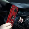A hand holding a red phone case with a ring holder, attached to a magnetic car mount on a car air vent. Produktbild-Vorschau