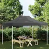 A party tent set up in a garden with a picnic table and benches underneath. Anteprima dell’immagine prodotto