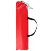 A red bag with black handles and a drawstring closure, likely for a foldable chair or lounge chair. Produktbild-Vorschau