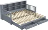 A gray wooden daybed with a pull-out trundle bed and storage drawers, shown with the trundle extended and drawers open. Anteprima dell’immagine prodotto