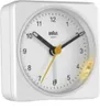 A white Braun analog alarm clock with a white face and black hands. Podgląd zdjęcia produktu