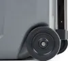 A close-up view of the wheels and lower side of a gray cooler. Náhled obrázku produktu
