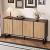 A modern sideboard with a wood-look finish and a minimalist design, placed in a living room setting with decorative items on top and framed pictures on the wall. Anteprima dell’immagine prodotto