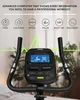 Close-up of an exercise bike's console and handlebars, with overlaid text and icons highlighting features. Produktbild-Vorschau