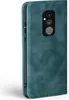 A close-up side view of a teal flip case for a smartphone, showing the camera cutout. Produktbild-Vorschau