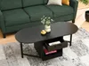 A living room scene with a green sofa and a black coffee table. Náhľad obrázku produktu