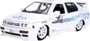A white Jada Fast&Furious 1995 Volkswagen Jetta 1:24 scale model car is shown from a three-quarter front angle against a white background. Voir les images du produit