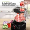 A food processor is shown with tomatoes being added to it, and sliced vegetables are displayed in the foreground. The background is a kitchen setting. Produktbild-Vorschau