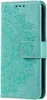 A teal flip case cover for a Samsung Galaxy A54 5G phone, featuring an embossed mandala pattern. Produktbild-Vorschau