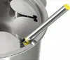 Das Unold Fondue Elégance besteht aus einem eleganten Metallutensil mit gelbem Ende, das auf dem Ran Produktbild-Vorschau