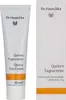 A product shot of a tube of Dr. Hauschka Quince Day Cream and its packaging. Produktbild-Vorschau
