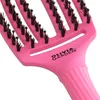 A close-up shot of a pink hairbrush with black bristles. Anteprima dell’immagine prodotto