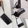Collage of images showing a black phone case with a wrist strap and card slots, demonstrating its features and how it can be worn. Produktbild-Vorschau