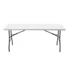 A white rectangular folding table with black legs, shown from the front on a white background. Voir les images du produit