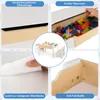 A collage of images showing different features of a children's table and chair set. Produktbild-Vorschau