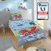 A child's bed with bedding featuring fire trucks and police cars. Produktbild-Vorschau