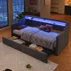 A modern daybed with integrated LED lighting and storage drawers, set in a stylish room with a city view at night. Náhled obrázku produktu