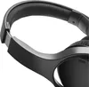 Close-up view of the headband and part of the earcups of black over-ear headphones. Produktbild-Vorschau