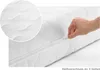 A hand is shown zipping up a white mattress cover. Produktbild-Vorschau