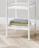 A white shelving unit with books on one of the shelves. Náhled obrázku produktu