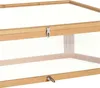 A close-up view of a wooden cold frame with clear plastic panels and metal latches. Náhled obrázku produktu