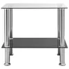 A modern side table with a transparent glass top and shelf supported by chrome-plated metal legs. Anteprima dell’immagine prodotto
