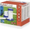 The image shows the retail packaging of a Bestway Flowclear cartridge filter pump for swimming pools, placed on a grassy surface. Voir les images du produit