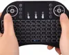 Hands holding a black wireless keyboard with a touchpad. Anteprima dell’immagine prodotto