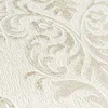 A close-up of textured wallpaper with a damask pattern. Produktbild-Vorschau