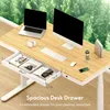 A desk with a laptop, monitor, keyboard, mouse, and a drawer with items inside, set against a backdrop of trees. Produktbild-Vorschau