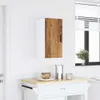 A wall-mounted cabinet with a wood-look front panel is shown in a room setting. Produktbild-Vorschau