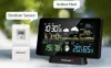 A wireless weather station with an outdoor sensor and an indoor host display, set against a blurred green and light gray background. Náhled obrázku produktu