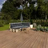 An outdoor seating area on a wooden deck with a sectional sofa made of pallets and cushions, a small coffee table, and surrounding greenery. Produktbild-Vorschau