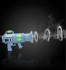 A blue toy gun emitting smoke rings against a black background. Náhled obrázku produktu